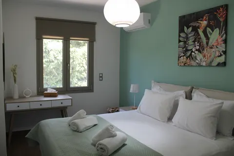 The Mint Room with its dressing table and garden window